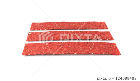 Beetroot crackers, thin rusk beet root bread, red diet multigrain crispbread, various seeds 124699488