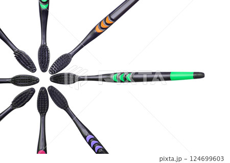 Black toothbrushes with colored stripes for cleaning 124699603
