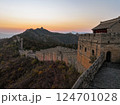Great wall of China at sunset with rolling hills at dusk 124701028