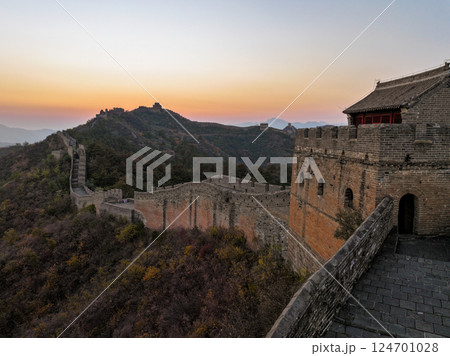 Great wall of China at sunset with rolling hills at dusk 124701028