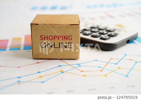 Online shopping, Shopping cart box on calculator, import export, finance commerce. 124705019