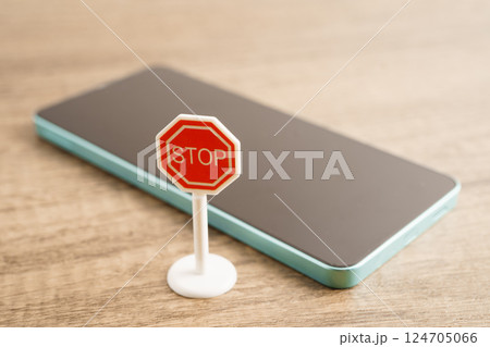 Sign stop, Do not use smartphone for safety and good health. Sign stop, Do not use smartphone for safety and good health. 124705066