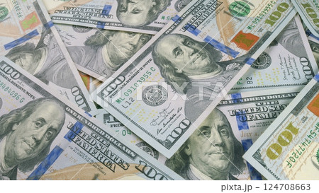 A sizable pile of freshly minted one hundred dollar bills ready for transactions and trade A sizable pile of freshly minted one hundred dollar bills ready for transactions and trade 124708663