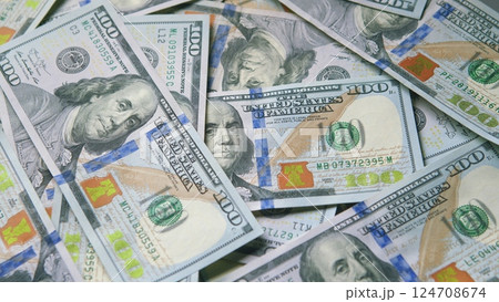 A detailed CloseUp image showcasing U.S. Hundred Dollar Bills that are strategically overlapping A detailed CloseUp image showcasing U.S. Hundred Dollar Bills that are strategically overlapping 124708674