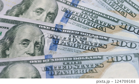A CloseUp Image of U.S. One Hundred Dollar Bills and Their Significance in Finance and Commerce 124709168
