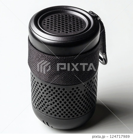 Sleek black portable bluetooth speaker with fabric detail for modern and stylish audio experience 124717989