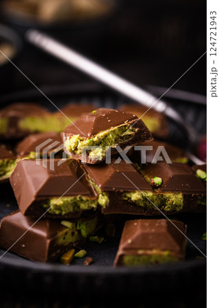 Dubai chocolate with kadayif pistachio filling 124721943