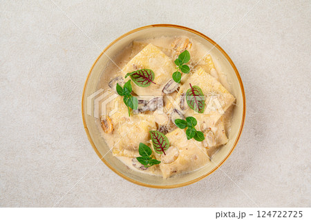 Portion of gourmet ravioli with cream sauce Portion of gourmet ravioli with cream sauce 124722725