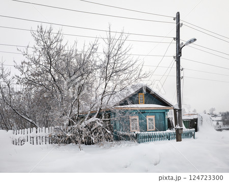 Russian hut in a snowy winter. Russian hut in a snowy winter. 124723300