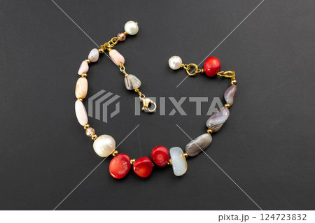 Unique bracelet for women on a black background, promotional photo for an online vintage and handmade jewelry store 124723832