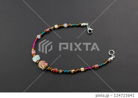 Unique bracelet for women on a black background, promotional photo for an online vintage and handmade jewelry store Unique bracelet for women on a black background, promotional photo for an online vintage and handmade jewelry store 124723841