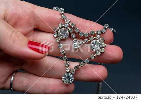 Unique necklace for women on a black background, promotional photo for an online vintage and handmade jewelry store 124724037