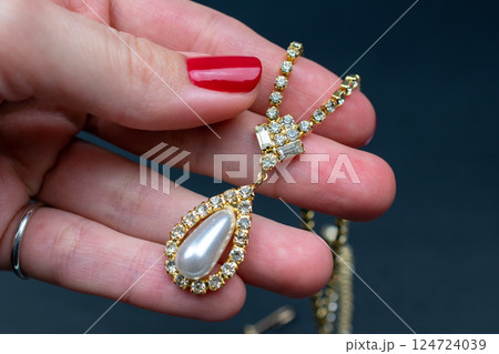 Unique necklace for women on a black background, promotional photo for an online vintage and handmade jewelry store Unique necklace for women on a black background, promotional photo for an online vintage and handmade jewelry store 124724039