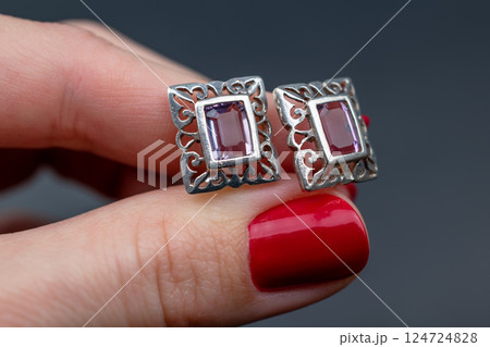 Unique earrings for women on a black background, promotional photo for an online vintage and handmade jewelry store Unique earrings for women on a black background, promotional photo for an online vintage and handmade jewelry store 124724828