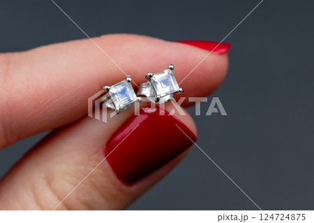 Unique earrings for women on a black background, promotional photo for an online vintage and handmade jewelry store Unique earrings for women on a black background, promotional photo for an online vintage and handmade jewelry store 124724875