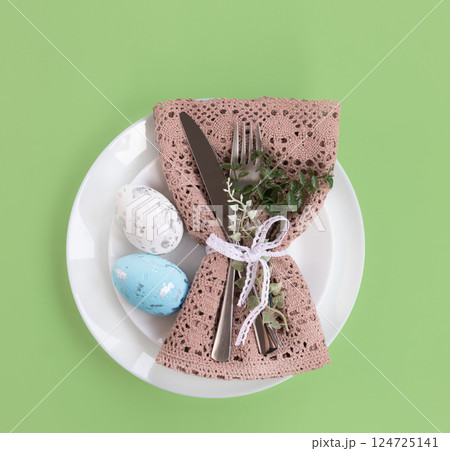 Easter celebration concept. Top view Napkin white plate eggs, isolated background, banner 124725141