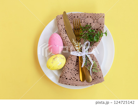 Easter celebration concept. Top view Napkin white plate eggs, isolated background, banner Easter celebration concept. Top view Napkin white plate eggs, isolated background, banner 124725142
