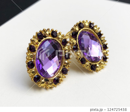 Unique earrings for women on a white background, promotional photo for an online vintage and handmade jewelry store Unique earrings for women on a white background, promotional photo for an online vintage and handmade jewelry store 124725438