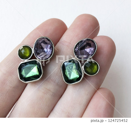 Unique earrings for women on a white background, promotional photo for an online vintage and handmade jewelry store 124725452