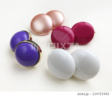 Unique earrings for women on a white background, promotional photo for an online vintage and handmade jewelry store Unique earrings for women on a white background, promotional photo for an online vintage and handmade jewelry store 124725493