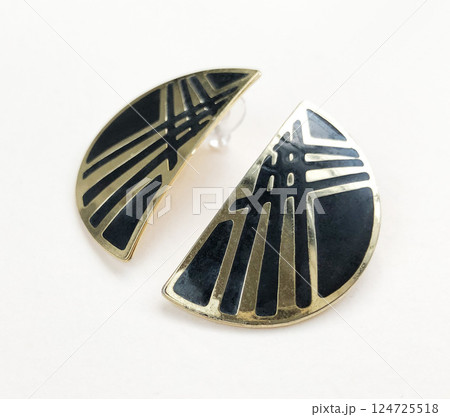 Unique earrings for women on a white background, promotional photo for an online vintage and handmade jewelry store 124725518