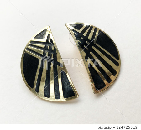 Unique earrings for women on a white background, promotional photo for an online vintage and handmade jewelry store 124725519