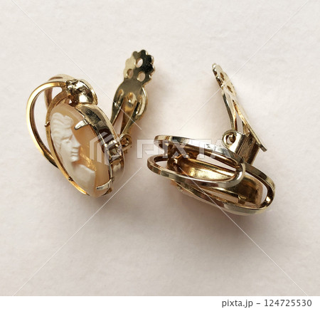Unique earrings for women on a white background, promotional photo for an online vintage and handmade jewelry store Unique earrings for women on a white background, promotional photo for an online vintage and handmade jewelry store 124725530