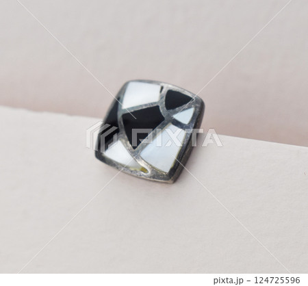 Unique earrings for women on a white background, promotional photo for an online vintage and handmade jewelry store Unique earrings for women on a white background, promotional photo for an online vintage and handmade jewelry store 124725596