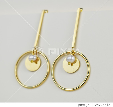 Unique earrings for women on a white background, promotional photo for an online vintage and handmade jewelry store 124725612