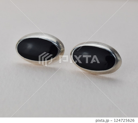 Unique earrings for women on a white background, promotional photo for an online vintage and handmade jewelry store 124725626