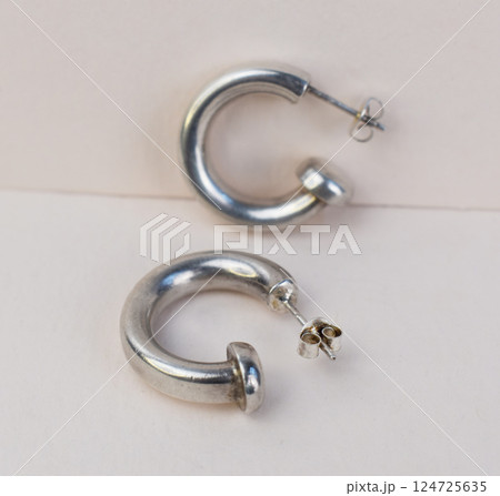 Unique earrings for women on a white background, promotional photo for an online vintage and handmade jewelry store 124725635