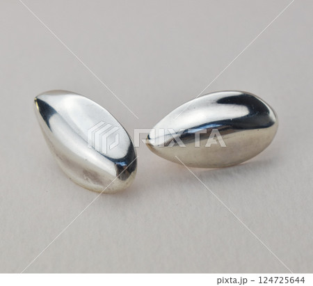 Unique earrings for women on a white background, promotional photo for an online vintage and handmade jewelry store 124725644