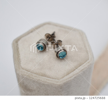 Unique earrings for women on a white background, promotional photo for an online vintage and handmade jewelry store 124725688