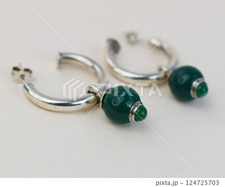 Unique earrings for women on a white background, promotional photo for an online vintage and handmade jewelry store Unique earrings for women on a white background, promotional photo for an online vintage and handmade jewelry store 124725703