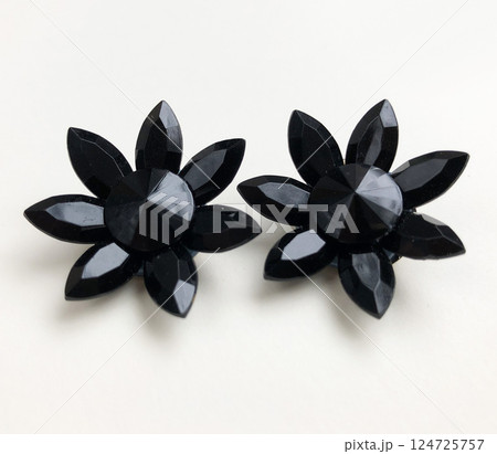 Unique earrings for women on a white background, promotional photo for an online vintage and handmade jewelry store Unique earrings for women on a white background, promotional photo for an online vintage and handmade jewelry store 124725757