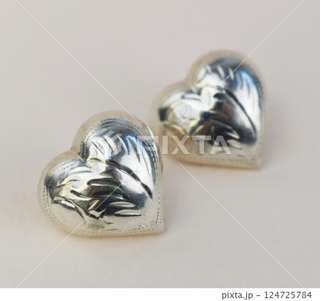 Unique earrings for women on a white background, promotional photo for an online vintage and handmade jewelry store Unique earrings for women on a white background, promotional photo for an online vintage and handmade jewelry store 124725784