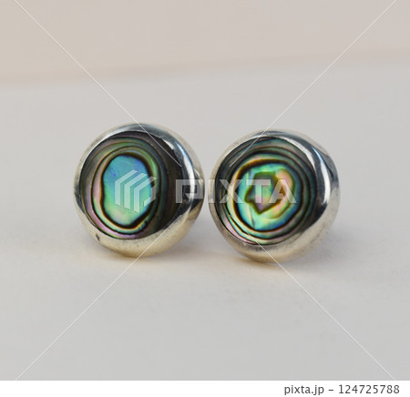 Unique earrings for women on a white background, promotional photo for an online vintage and handmade jewelry store 124725788