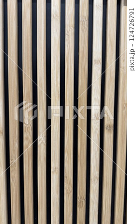 Modern Wooden Slats Against Black Background for Architectural Concept 124726791