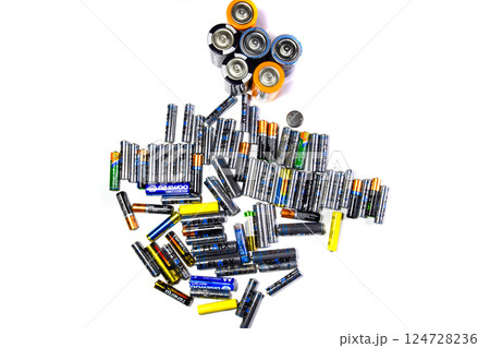 Salt and alkaline batteries, a source of energy for portable technology. AAA and AA batteries 124728236