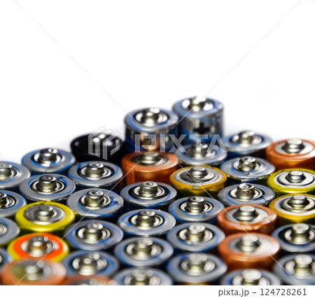 Salt and alkaline batteries, source of energy for portable technology. AAA and AA batteries 124728261