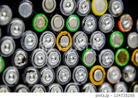 Salt and alkaline batteries, source of energy for portable technology. AAA and AA batteries 124728288