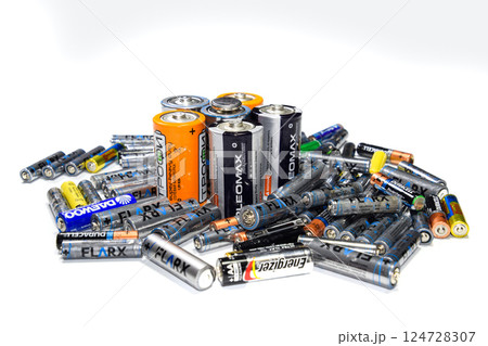 Salt and alkaline batteries, a source of energy for portable technology. AAA and AA batteries 124728307