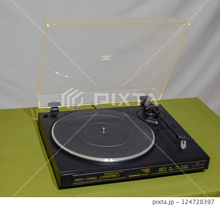 Sanyo turntable, vinyl player. Vintage analog player. Sanyo turntable, vinyl player. Vintage analog player. 124728397