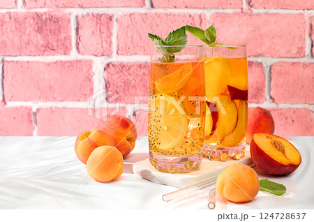 Diet vegan cocktail with chia seeds, lime, lemon, mint and apricots. Detox diet and weight loss concept, summer party and healthy lifestyle advertising. Menu for cafe and restaurant. 124728637
