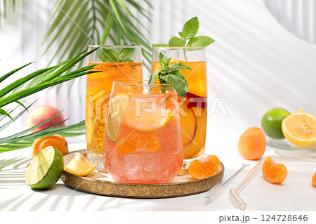 Summer party and healthy lifestyle advertising banner, diet vegan cocktail with chia seeds, lime, lemon, mint and apricots. Detox diet and weight loss concept, Menu for cafe and restaurant. Summer party and healthy lifestyle advertising banner, diet vegan cocktail with chia seeds, lime, lemon, mint and apricots. Detox diet and weight loss concept, Menu for cafe and restaurant. 124728646