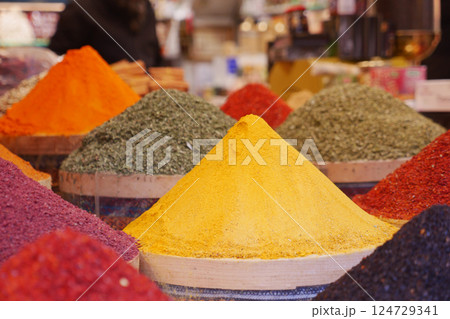 Experience the Vibrant Spices Displayed in Colorful Baskets at the Local Market Today Experience the Vibrant Spices Displayed in Colorful Baskets at the Local Market Today 124729341