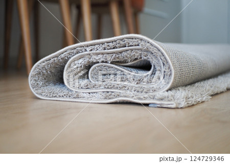 This Elegant Rolled Area Rug significantly enhances Wooden Floors, adding both warmth and charm 124729346