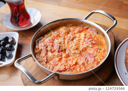 Turkish Menemen omelet in a frying pan. . Turkish Menemen omelet in a frying pan. . 124729366