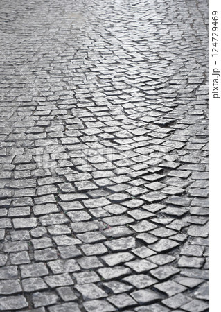 Textured Cobbled Streets that Effortlessly Showcase a Worn and Distinctive Aesthetic Appeal 124729469