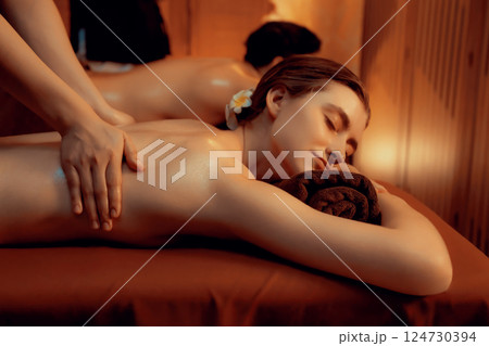 Caucasian couple customer enjoying relaxing anti-stress massage. Quiescent 124730394